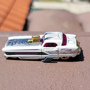 2014 Mattel Hot Wheels Walmart  Easter Metrorail Nash Metropolitan Diecast Car